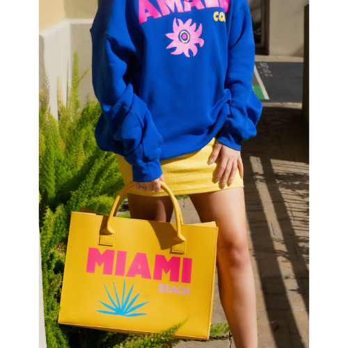 Fashionable yellow Miami Beach tote bag with a colorful design, ideal for summer getaways and beach trips.